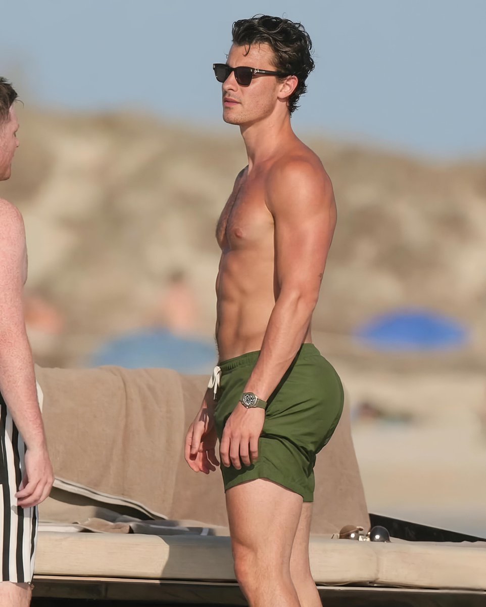 dorawhite47's tweet photo. Shawn Mendes relaxing shirtless on a sunny beach..... https://t.co/npwJKxq7QX