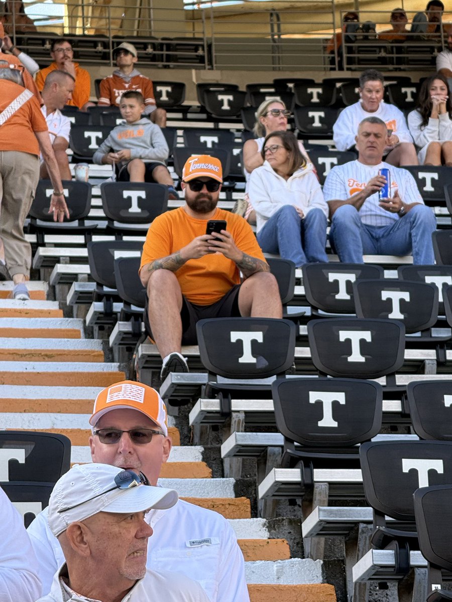 VolBandit4's tweet photo. Spends all off season tweeting about what fans wear, shows up to checker Neyland wearing orange in a white section. https://t.co/CKPP88xonE