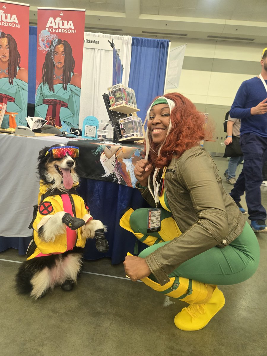heroinitiative's tweet photo. Day 2 at @baltimorecomics! Meet our seven incredible creators at booth 1701, join The Hero Initiative’s live art auction at 5 p.m. in Rooms 339–342, and celebrate comics at tonight’s Ringo Awards. See you there! #BeTheHero #BCC2026 https://t.co/ZoiBMUeOEQ