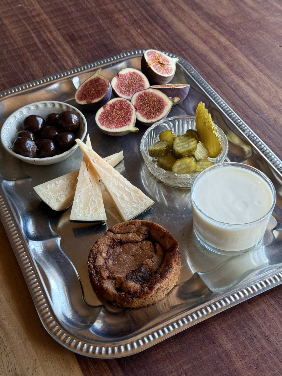 wolffdew's tweet photo. Snack plate for me: 3 figs, goat cheese, kefir with honey and ginger, pickles, chocolate covered cherries and a homemade cookie with chocolate and caramel https://t.co/IuOpUnQD6l