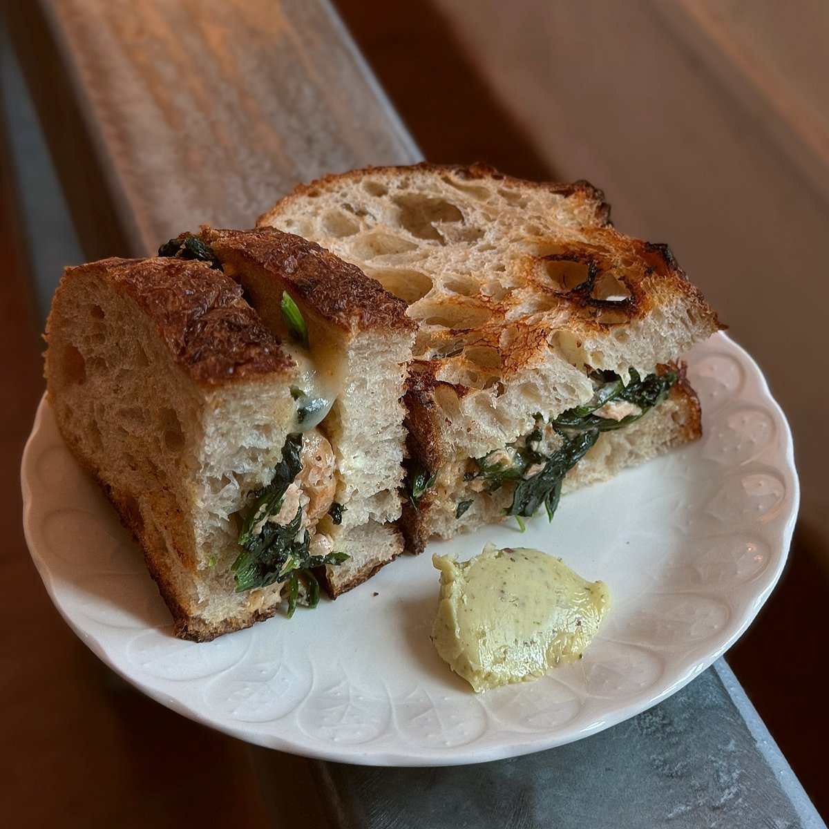 LynetteBoli5's tweet photo. Finally visited the cafe with the big moon. Ceres at Circular Road, Clarke Quay. The sandwich was disappointing for $17, with little salmon and barely any cheese, but the sautéed spinach, sourdough and wasabi mayo were tasty. The tiramisu was https://t.co/rtRAC2Wxh1