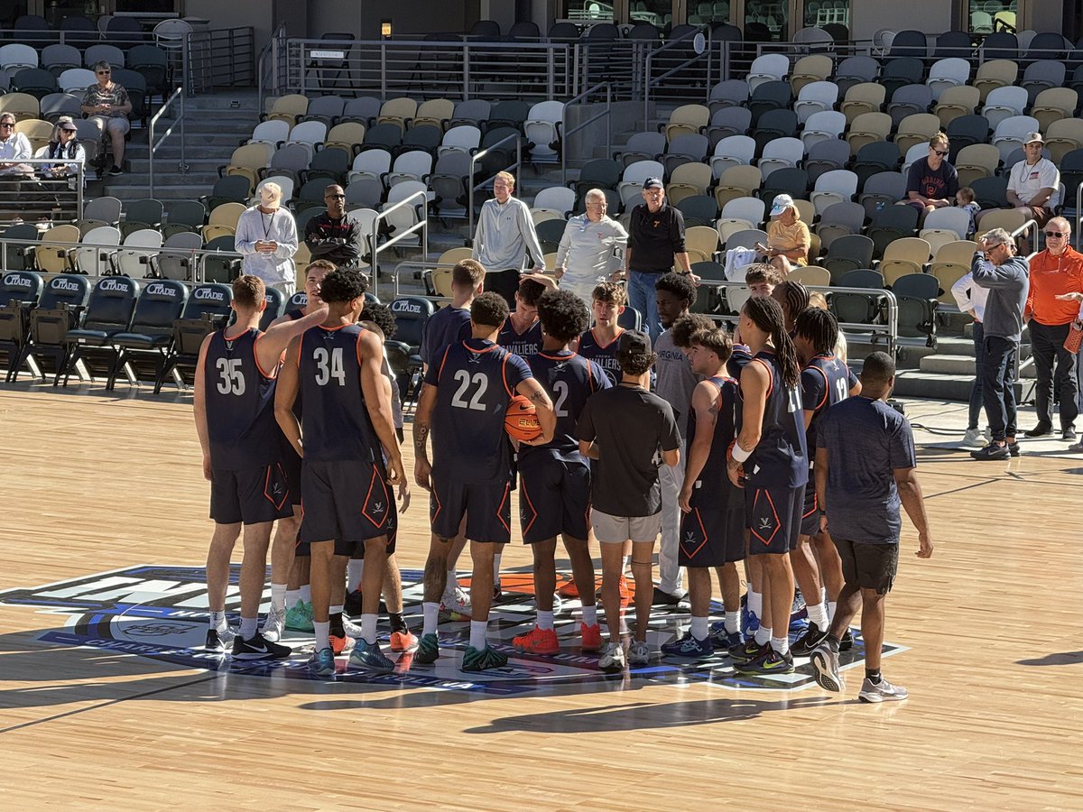 SEisbergWCIV's tweet photo. OK. This is freaking cool. The Virginia Cavaliers practicing under the blue skies and above the green clay of Daniel Island. Visions become reality. https://t.co/yQTEhGQBee