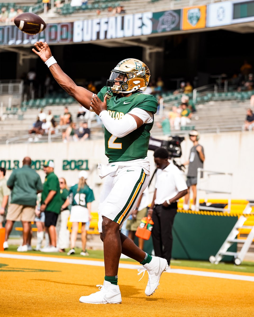 BUFootball's tweet photo. QB1 in the best uniforms in the country 💚🐾 https://t.co/Xg8rTf29e0
