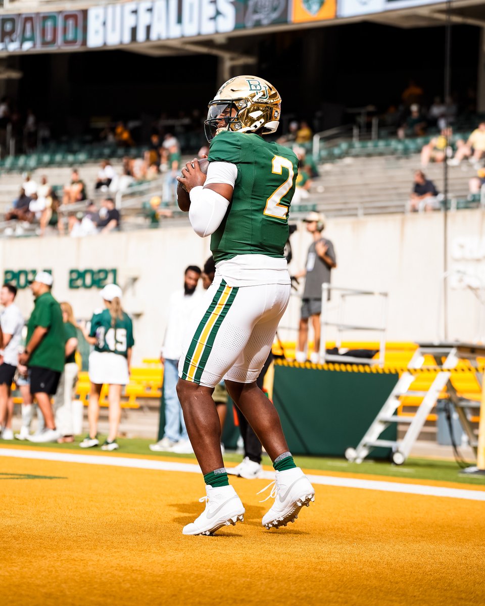 BUFootball's tweet photo. QB1 in the best uniforms in the country 💚🐾 https://t.co/Xg8rTf29e0