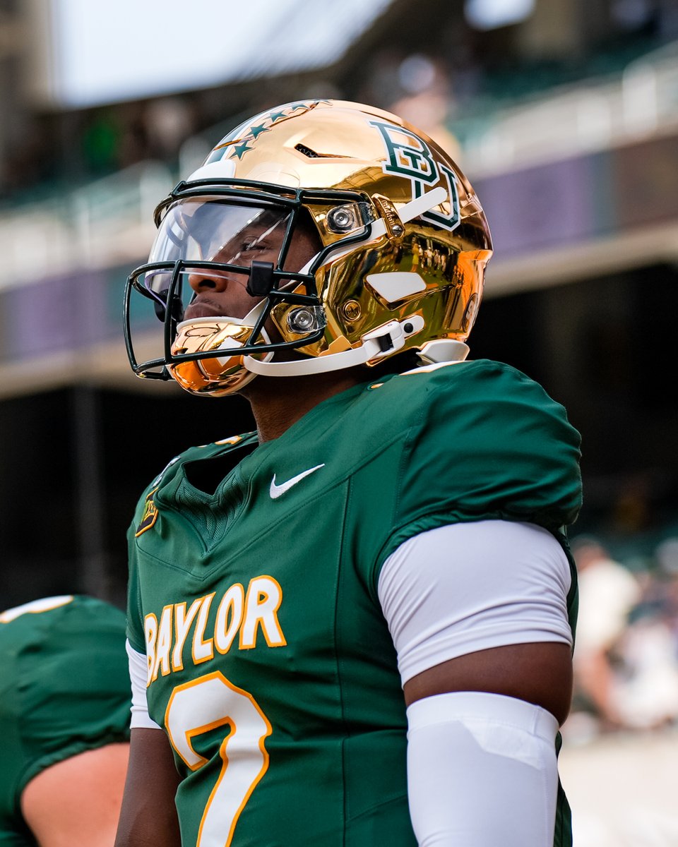BUFootball's tweet photo. QB1 in the best uniforms in the country 💚🐾 https://t.co/Xg8rTf29e0