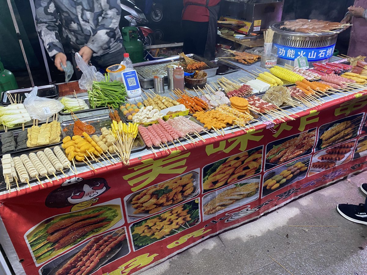 KeeshaShehorn's tweet photo. Craving something crispy and savory Spicy fried skewers from the street stall hit different—golden, crunchy outside, juicy inside, with a kick of chili flakes. Perfect on a casual walk! https://t.co/yovO4EXBYx