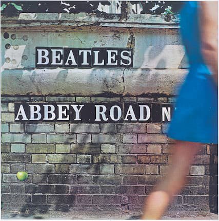 Beatlesfab40's tweet photo. The girl in the blue dress on the back cover of the #Beatles' #AbbeyRoad album remains unidentified. She walked past the street sign as photographer Iain Macmillan was taking the photo on August 8, 1969. She has never come forward and her identity has never been confirmed. https://t.co/F7rUufpQpm