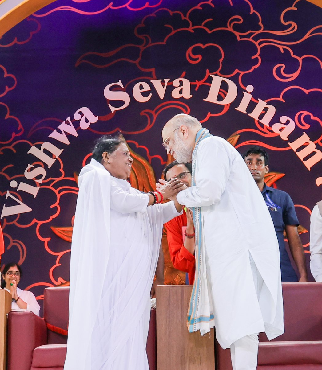 AmitShah's tweet photo. Mata Amritanandamayi Ji is the manifestation of the highest values of our culture, which upholds service to humanity and the poor as service to the Supreme Being. Her unconditional affection is a ray of light that has transformed the lives of millions, and her wisdom shows the path of benevolence to humanity.

Attended the ‘Vishwa Seva Dinam’ and ‘Amrit Keerthi Puraskar’ programmes held as a mark of gratitude to the great spiritual leader on the occasion of her 73rd birth anniversary in Kollam, Keralam.
