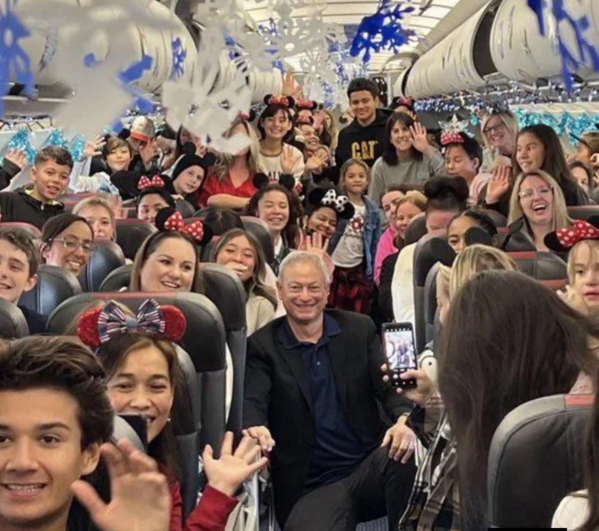 archeohistories's tweet photo. Actor Gary Sinise leads the annual Snowball Express event, taking over 1,700 family members of fallen service members to Walt Disney World for free.... 

The trip was organized through Snowball Express, a program operated by the Gary Sinise Foundation for the children and surviving spouses of fallen military service members.

In December 2019, approximately 1,000 Gold Star children traveled to Orlando for several days at Walt Disney World.

The experience included airfare, lodging, meals, entertainment and activities designed to help families build new memories during an emotionally difficult time of year. American Airlines provided flights from cities across the country, with employees and volunteers decorating terminals and aircraft for the children.

The purpose extended far beyond a free vacation. Children who had lost a parent through military service were able to meet others who understood their grief without needing it explained.

The program combined celebration with remembrance, giving families opportunities to honor the people they had lost while forming lasting friendships.

Sinise became widely associated with supporting military families after playing wounded Vietnam veteran Lieutenant Dan Taylor in Forrest Gump. He later created the Gary Sinise Foundation and formed the Lt. Dan Band, performing for service members and raising money for veterans, first responders and their families.

Snowball Express began in 2006 and was inspired partly by a letter written by Army Pfc. Jesse Givens, who was killed in Iraq in 2003. In the letter, he told his wife to take their children to Disneyland if he did not return home.

#archaeohistories