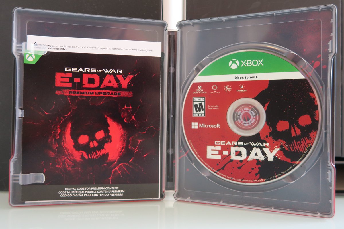 SASxSH4DOWZ's tweet photo. Gears of War E Day Collector's Edition includes a physical Xbox Series X game disc for a total size of 120.5 GB, it also features the Premium Upgrade digital code as well as a E Day Crimson Omen sticker! 👀🎮⚙️ https://t.co/PKtpZlU71e