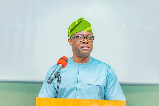 _Mister_SUPREME's tweet photo. Nigerians Will Not Surrender Presidency to a Man Notorious for Paralyzing LG – SSACO Bombs Makinde

The Senator Sharafadeen Alli Campaign Organisation (SSACO) has advised the Allied Peoples Movement (APM) to first demonstrate that it possesses the national structure and political strength required to mount a serious presidential challenge before hyping its presidential candidate Governor Seyi Makinde who will paralyze Nigeria’s 768 local governments and the six FCT Area Councils if he ever had the chance to occupy Aso Rock as number one citizen.
Describing as laughable the call by the party asking President Bola Ahmed Tinubu to step aside for Makinde, the SSACO in a statement by its Director of Media and Publicity Bisi Oladele, said it was the height of political hallucination for the APM to speak as if the presidency of Nigeria could be secured through press statements and political theatrics rather than through nationwide organization and electoral support.
Even if it were, the statement said Nigerians are not naive to surrender the presidency to a man notorious for paralyzing local governments which are effective channels of grassroots development.
The statement read in part: “APM’s Makinde is averse to the third tier of government in Nigeria, and this is evident in his seven-year anti-local government administration in Oyo State.
“Declaring an ambition is one thing; building the political structure required to prosecute a nationwide presidential election is another entirely. The APM should tell Nigerians how extensive its electoral structures are across the federation and demonstrate its capacity to compete effectively across the states and the Federal Capital Territory. It must have candidates across various elective positions in at least one third of the country to show seriousness.
“But can we blame the APM spokesperson for issuing a press statement at the end of the month in a subtle reminder to his hirers that his salary is due for payment?
“More importantly, even Governor Seyi Makinde, whom the APM now parades as its presidential candidate, has serious political battles to fight in his home state of Oyo where he has paralyzed the 33 local governments in the last seven years. In fact, he is gasping for breath politically in the state.
“A man seeking to conquer Nigeria must first demonstrate compelling political strength on his own turf. Charity, as the saying goes, begins at home.”
The SSACO stressed that the 2027 presidential election will not be decided by who issues the loudest press statement but by Nigerians whose children now enjoy student loan, enjoy establishment of new federal universities, witness construction of super highways and reconstruction of multiple inter-state and inter-city roads as dividends of democracy under President Tinubu’s Renewed Hope Agenda.