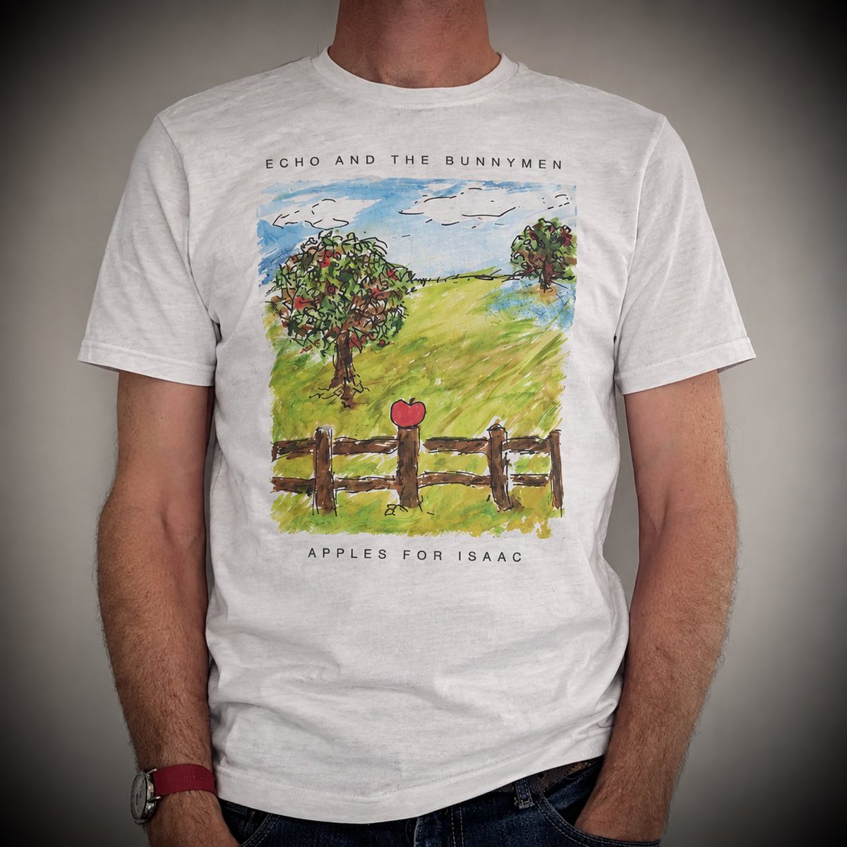 Bunnymen's tweet photo. REGENT’S PARK 2026
After two incredible sold-out nights at London’s Regent’s Park Open Air Theatre, we’re pleased to offer the official souvenir T-shirt from these very special shows.
Stock is extremely limited, and once they’re gone, they’re gone. 🐰🍎 (not sure why it says AI content as its me in my spare room 🤷🏻)
https://t.co/QEOTdKz6bS