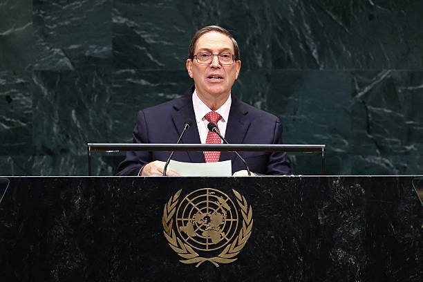 HodelinMoya's tweet photo. Canciller cubano en la ONU: ¨EE.UU. impone a Cuba un bloqueo energético, equivalente a un bloqueo naval y acto de guerra. Más de 7.000 contenedores detenidos con alimentos y medicinas¨. #CubaNoEsUnaAmenaza #ElBloqueoSí #PrimeraTrinchera #TumbaElBloqueo https://t.co/2op3bDOvCW