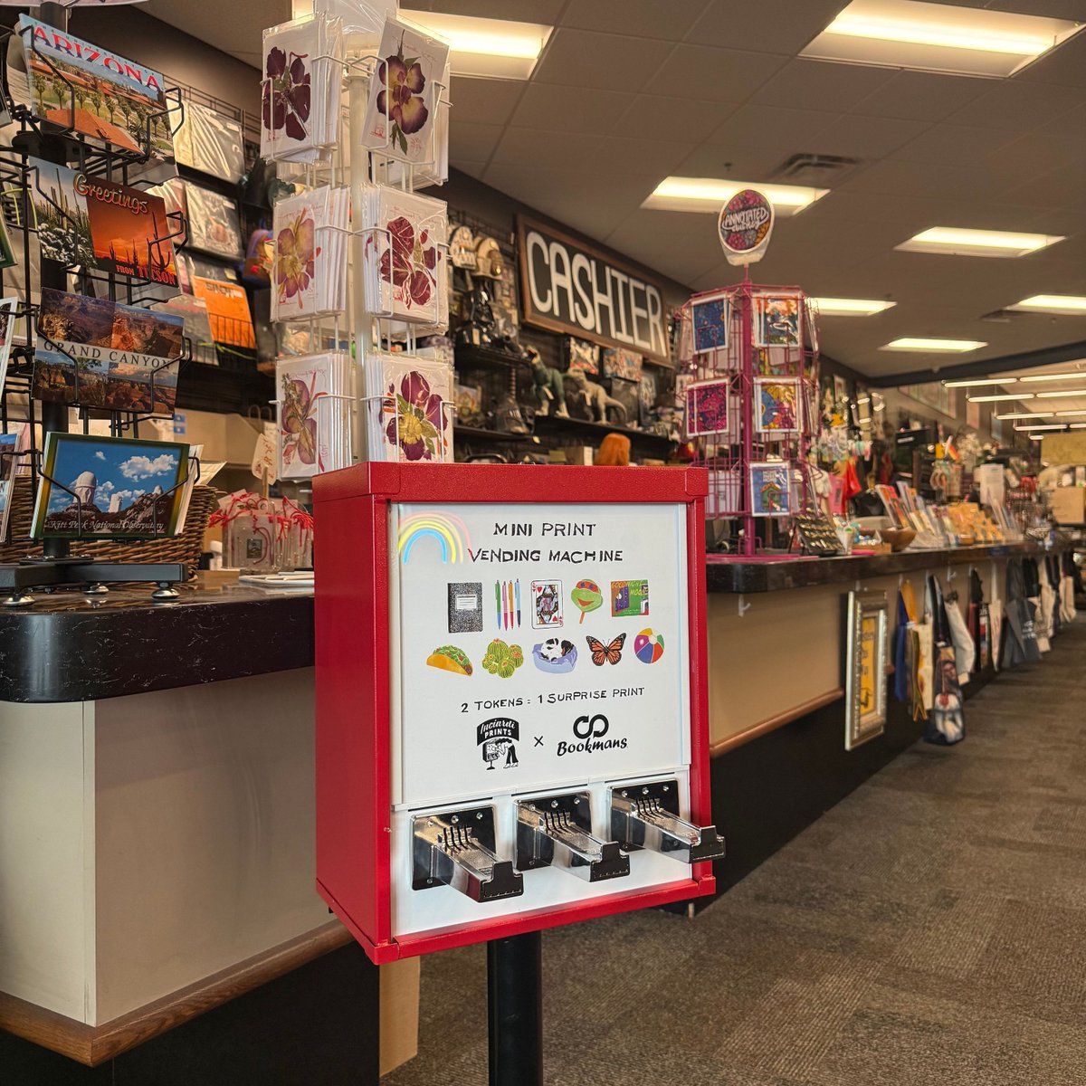 bookmans's tweet photo. It's here! 🌈 The @inciardimachines Mini Print Vending Machine has officially landed at Bookmans River, and every print inside is a work of art for a buck. Ten designs available, one surprise at a time.
 
Which one are you hoping to pull first?
 
#BookmansFinds https://t.co/o4XczOENRT