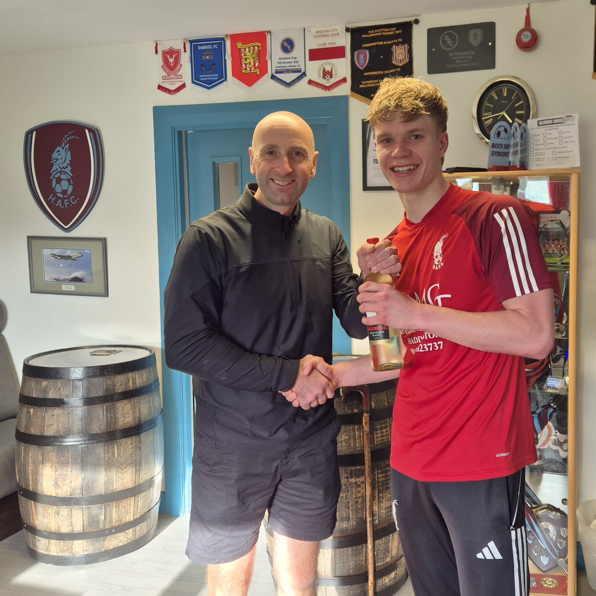 HaddAth's tweet photo. SATURDAY'S MAN OF THE MATCH

It's a second successive Millfield MotM award for @EwinsAaron who performed very well today in an unfamiliar forward role - teetotal Aaron's pictured here receiving another bottle for mum Tracy's drinks cabinet from our co-chair @JamieMa92376149 https://t.co/xRZXPQxXCM