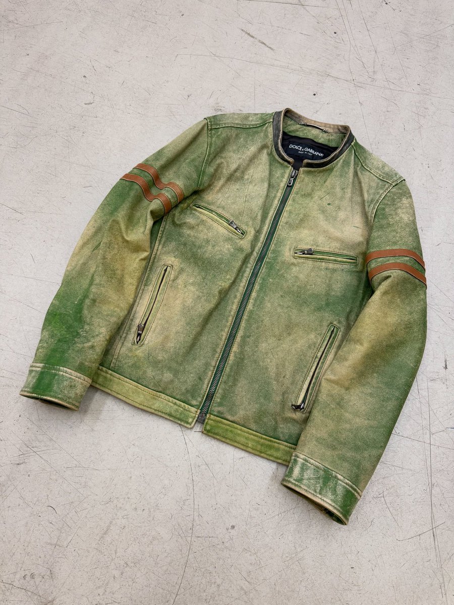 theattractmag's tweet photo. 2000s dolce &amp; gabbana biker aged green leather jacket https://t.co/8DeuaYx6X0