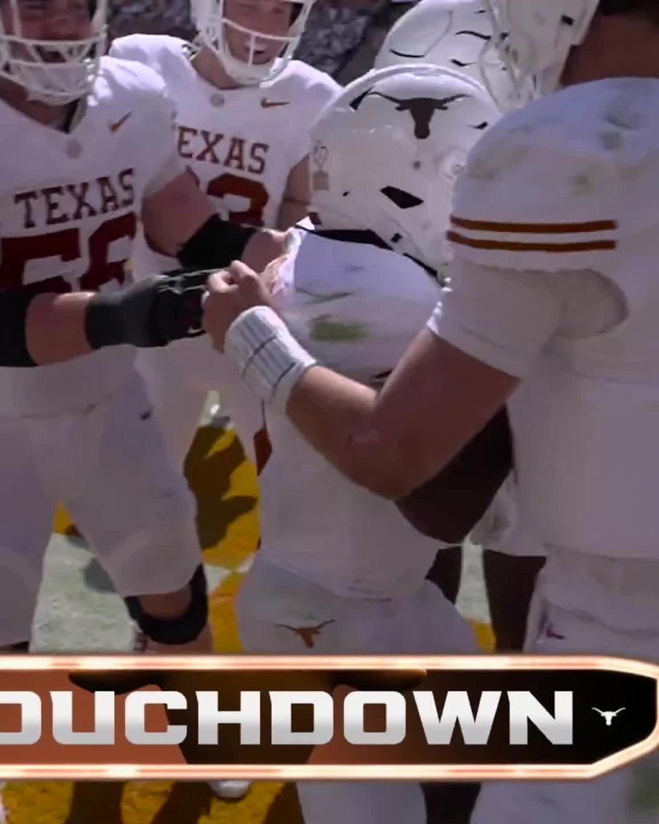 University of Texas Longhorns football players celebrating a touchdown in white jerseys, with 'TOUCHDOWN' text overlay.