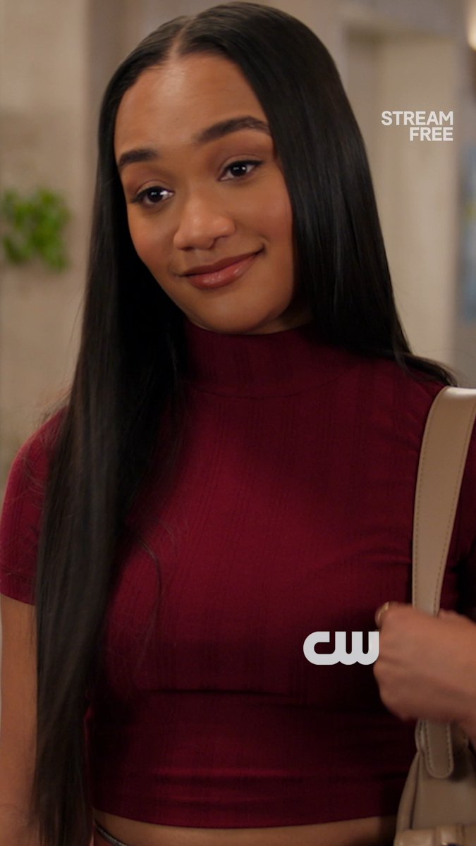 A woman with long dark hair wearing a burgundy crop top and carrying a beige bag smiles softly, with "STREAM FREE" text and the CW logo visible in the image promoting the All American series finale airing Monday at 8/7c.