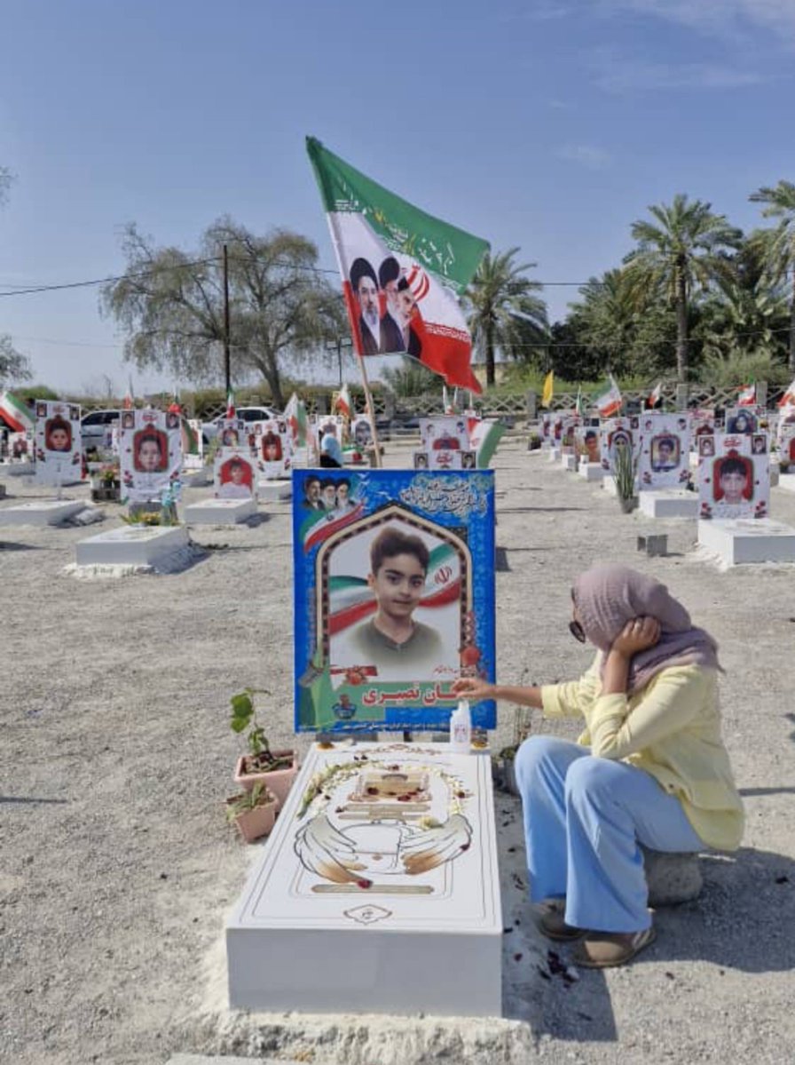 Bushra1Shaikh's tweet photo. When I visited the graves of the martyred Minab School children, I sat next to Makan's empty grave. It was heartbreaking knowing that his mother would never get to say goodbye or bury her son. She asked me to never let the world forget that Donald Trump killed their only child. https://t.co/ubUbhIMsul