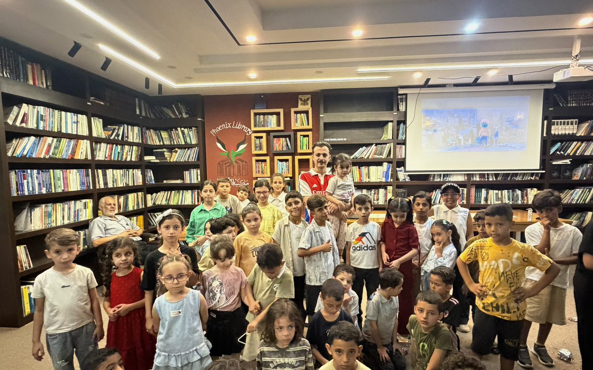 OmarHamadD's tweet photo. I can hardly describe the joy and happiness of the children today as they watched the movie Coco at @phoenixlibrary1 . They were on cloud nine, and I was just as immersed, feeling completely detached from reality for two hours. A simple initiative was all it took to bring back a sense of life, if only for a few moments, far from the nightmares of destruction and shelling left behind by the Israeli occupation in our minds and the minds of our children.

Honestly, for the first time in my life, I want to thank myself. Seeing those smiles on the children's faces is truly the greatest treasure in life.