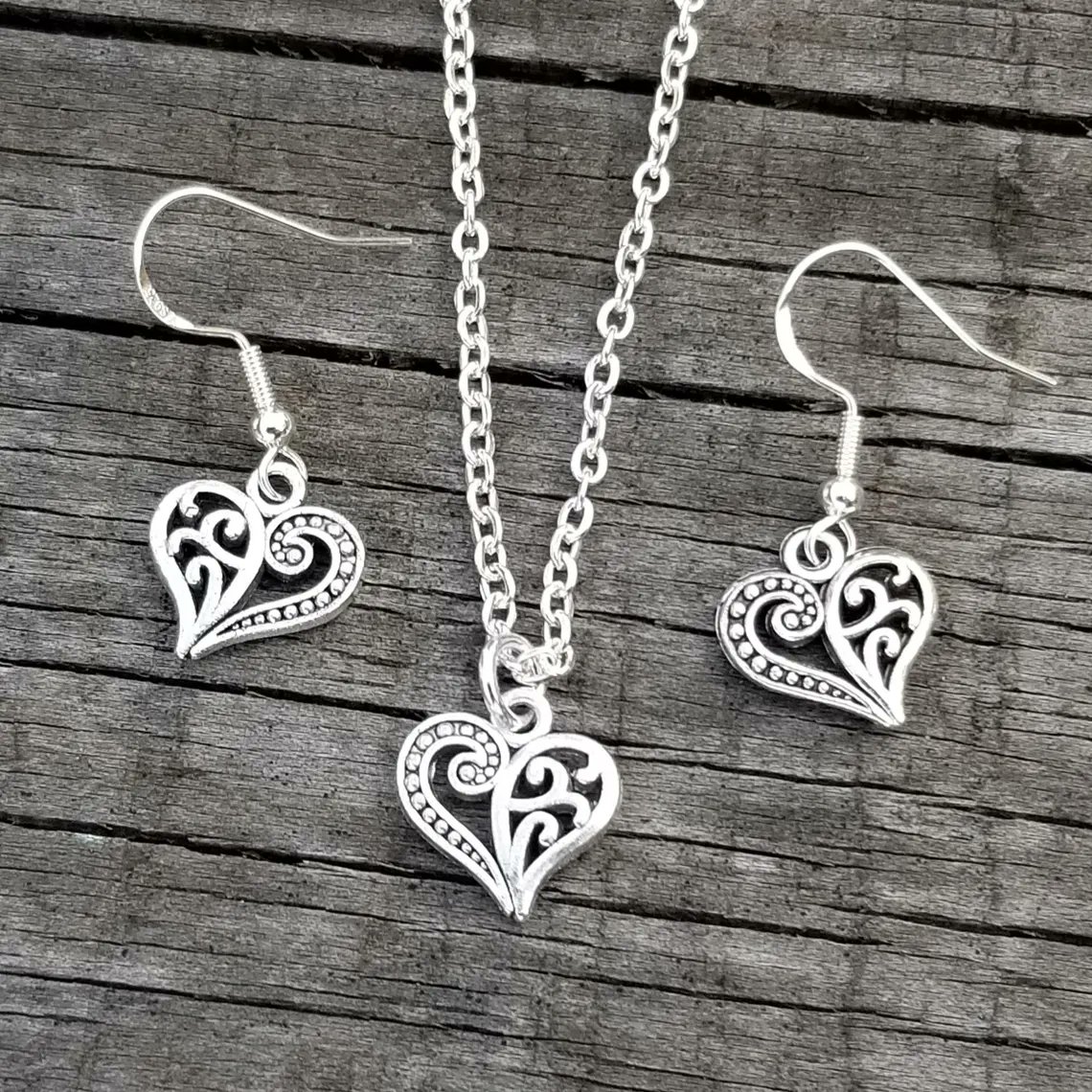 TrendingNowGift's tweet photo. Silver Filigree Heart Necklace Set #jewelry #necklace #earrings #jewelryset #necklaceset #earringsset #handmadejewelry #giftforher #etsy #heart #heartjewelry #heartnecklace #heartearrings https://t.co/NKusbIsvRC via @Etsy https://t.co/E9x4AneCzE