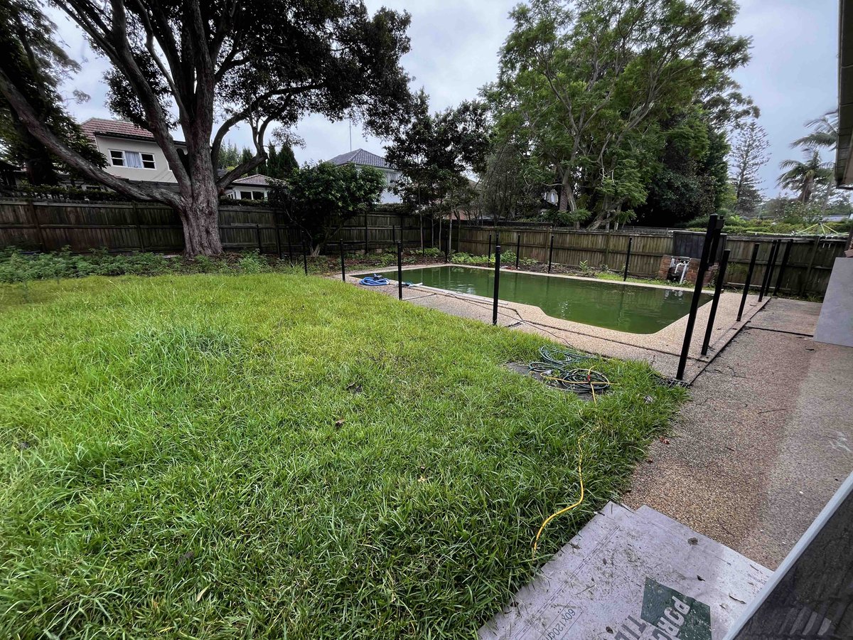 mypoolpainter's tweet photo. Sydney based, Text us @ 0438 553 000  Lawn was removed, new drainage installed, yard levelled,new lawn laid, 46 mtrs of new planter boxes, new &amp; extended paving, frameless glass pool fence.  #landscaping #swimmingpools #paving #backyardmakeover https://t.co/wNKlY3RLhX