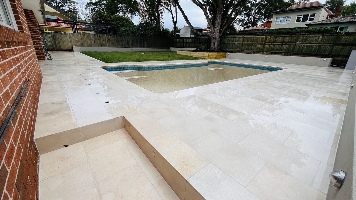 mypoolpainter's tweet photo. Sydney based, Text us @ 0438 553 000  Rain was not helpful but we still managed to remove lawn, new drainage installed, yard levelled,new lawn laid, 46 mtrs of new planter boxes, new & extended paving, frameless glass pool fence.  #landscaping #swimmingpools #paving #backyardmakeover