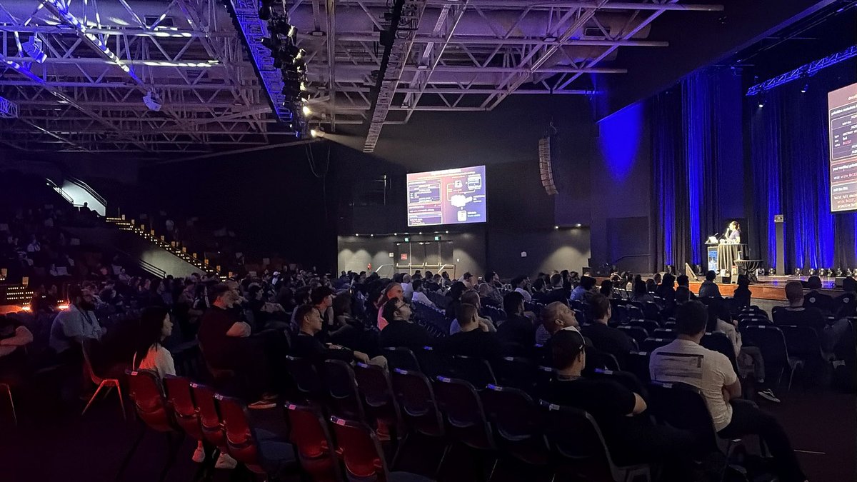 BSidesCbr's tweet photo. That’s Day 3 of BSides Canberra 2026.

Richard Buckland, @chompie1337, another huge day of talks, competitions wrapped, prizes handed out and one final announcement:

BSides Canberra 2027: 23–25 September.

What a week. See you next year! 💙 https://t.co/hVUoCJnNZv