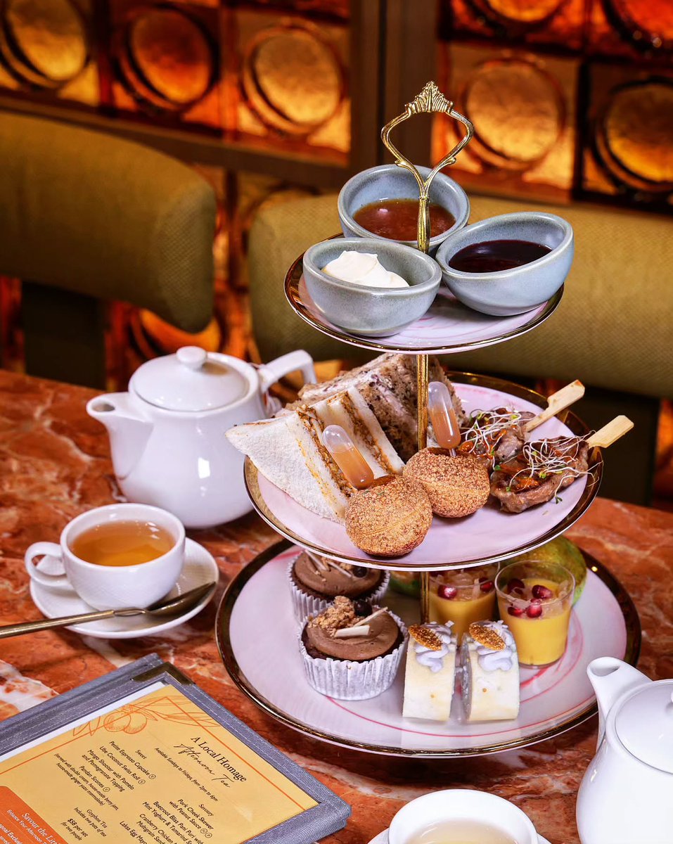 RettaDalomjd's tweet photo. Afternoon Tea with nostalgic local flavours in the heart of Orchard Road. Enjoy Laksa Egg Mayo Sandwiches, Pork Cheek Skewers with Peanut Sauce, Beetroot Bliss Pani Puri, Ube Coconut Swiss Roll, Pandan Scones and more in a thoughtful celebration of https://t.co/Fkwb1vAt5m