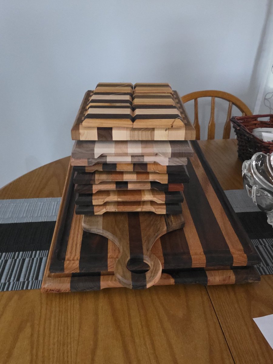 GDWorkbench's tweet photo. A stack of finished hardwood coaster sets, each with its own mix of contrasting grain and color. See project GD-P-359: https://t.co/7aHKEWpwai #GDWorkbench #Woodworking #Handmade https://t.co/HdWaPfOIyp