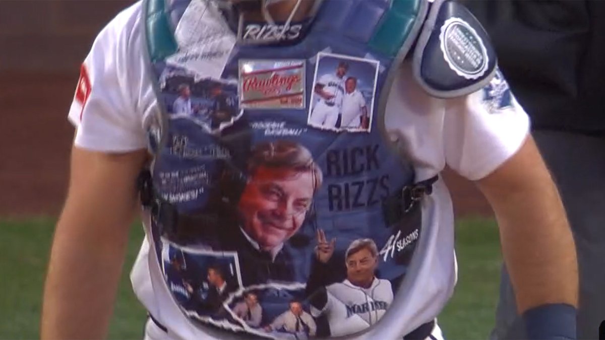 DKramer_'s tweet photo. Live look at Cal Raleigh’s chest protector, paying homage to Rick Rizzs during his final weekend in the Mariners’ radio broadcast booth... https://t.co/8KbkAt5Y8H