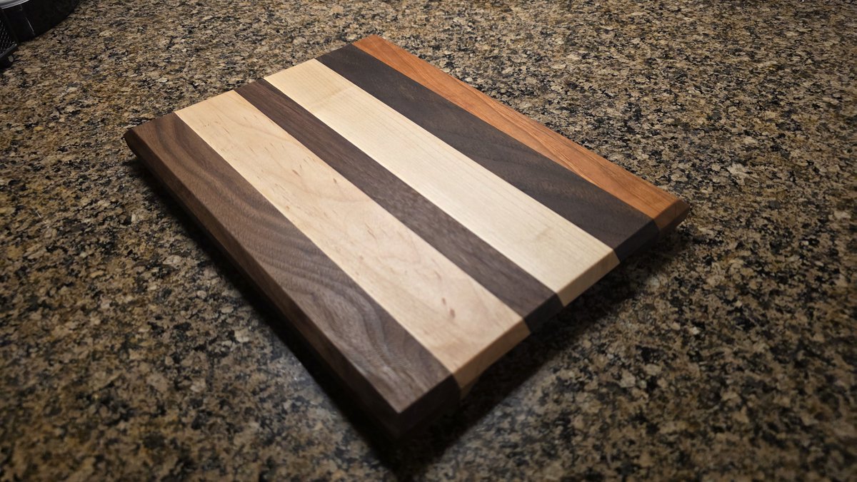 GDWorkbench's tweet photo. A closer look at the finished walnut, cherry, and maple face-grain prep/cutting board from GD-P-230, with a smooth beveled edge. https://t.co/z931ZIfxJw #GDWorkbench #CuttingBoard #Woodworking https://t.co/DwAM8SwqgV