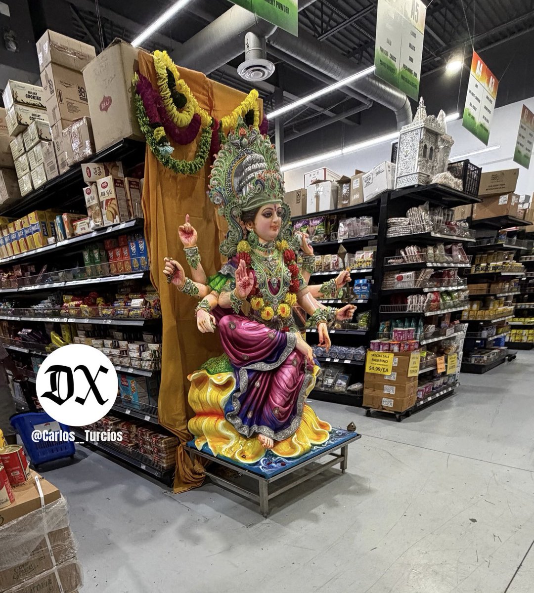 Carlos__Turcios's tweet photo. A photo from a Frisco store shows a GIANT Hindu deity idol displayed prominently at the front of the store.

@DallasExpress https://t.co/5tr2uGm9xx
