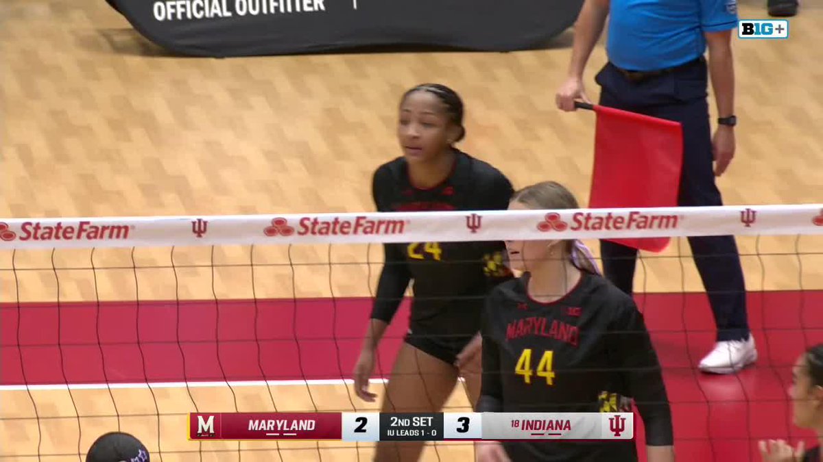 A screenshot from a Big Ten volleyball match showing Maryland players (#24 and #44) near the net, with the scoreboard reading Maryland 2, Indiana 3 in the 2nd set.