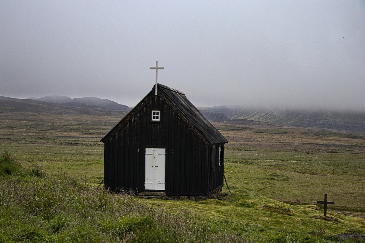 HortenseJayea's tweet photo. The charming Krýsuvíkurkirkja stands alone in Iceland’s dramatic landscape. Would you visit this peaceful spot? https://t.co/rmU3SUrf4g