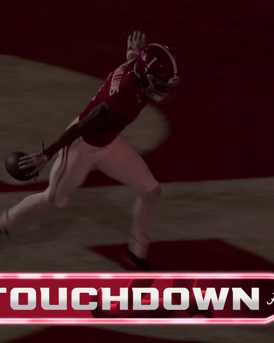 A football player in a red jersey crosses into the end zone to score a touchdown, with the word 'TOUCHDOWN' displayed at the bottom of the screen.