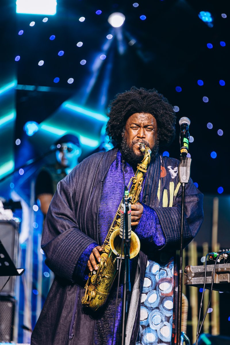 JoyOfJazz's tweet photo. KAMASI WASHINGTON is bringing his boundary-pushing sound and electrifying energy for a performance that promises to be nothing short of extraordinary. Be part of it, get your tickets now at Ticketmaster. #JazzReignited #SBJOJ2026 #TakeMeThere https://t.co/ck8Ses9sc1