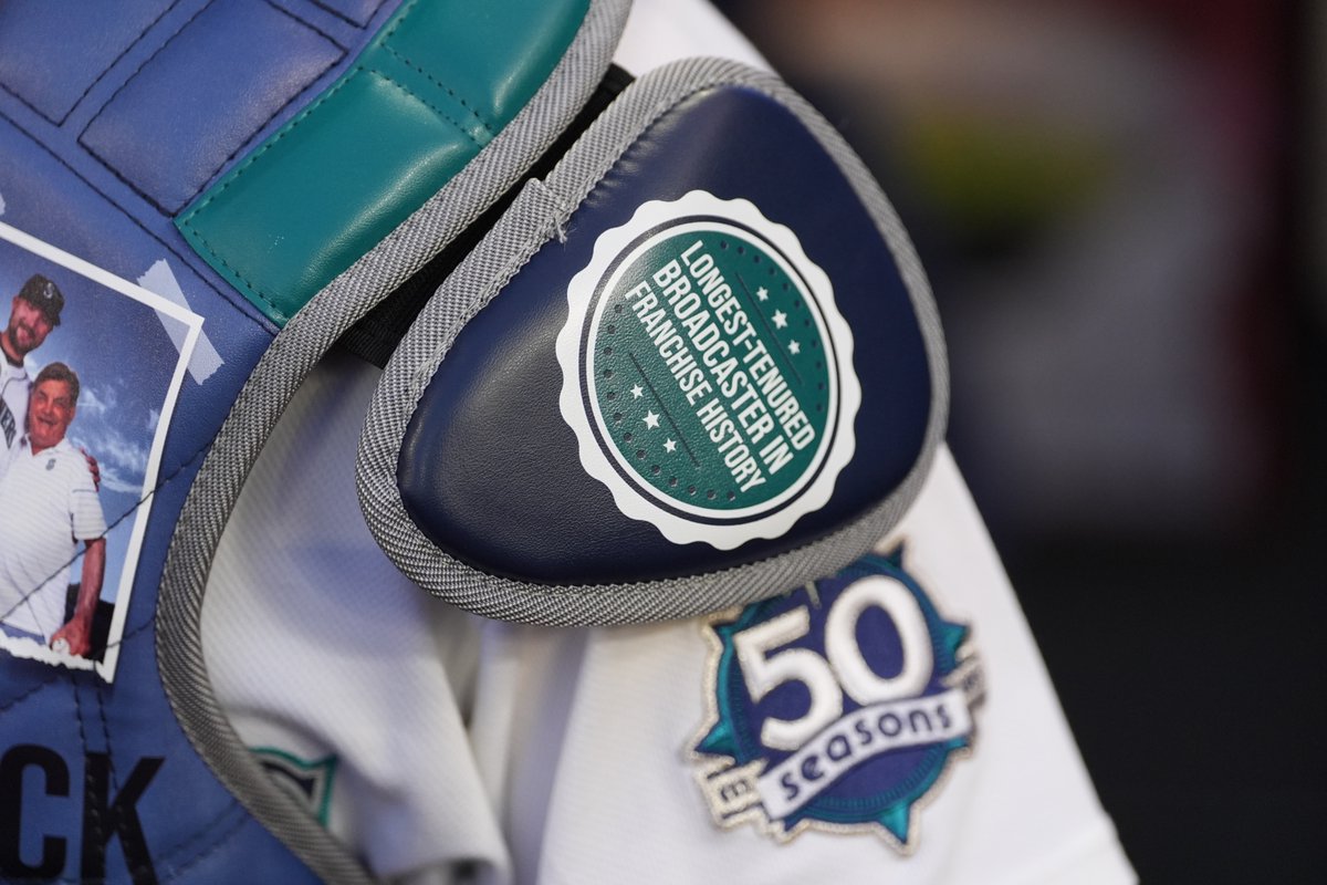 lindseywasson's tweet photo. Seattle #Mariners catcher Cal Raleigh wears a custom chest protector featuring Mariners radio play-by-play announcer Rick Rizzs during a baseball game against the Los Angeles Angels, Saturday, Sept. 26, 2026, in Seattle. (AP Photo/Lindsey Wasson) https://t.co/olPG6wXQxx
