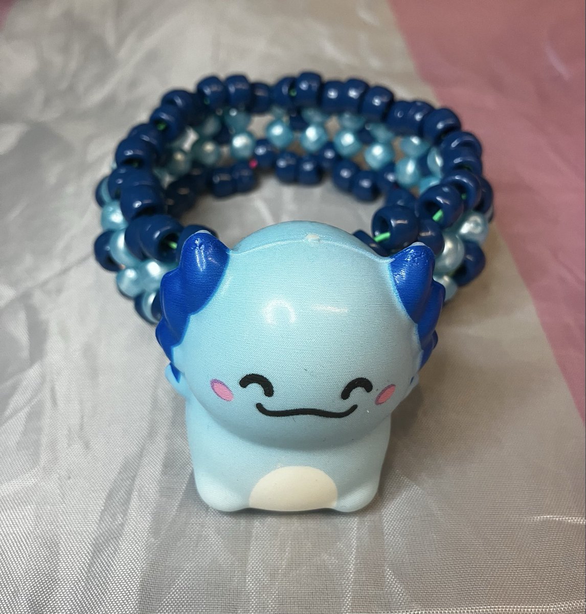 _wolfiewiccan_'s tweet photo. Squishy axolotl cuffs!

#axolotl #kandi #beads #squishy #stimtoy #sensorytoy #kandibeads #cuff #kandicuff #rainbow #y2k #scenecore #aesthetic #sparklefur https://t.co/E3l3xlbvKV