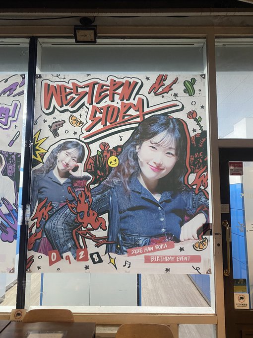 A store window poster for a 'Western Storm' birthday event for '2026 HAN BORA' featuring photos of a young woman in denim clothing with Western-themed decorations including cacti and a scorpion.