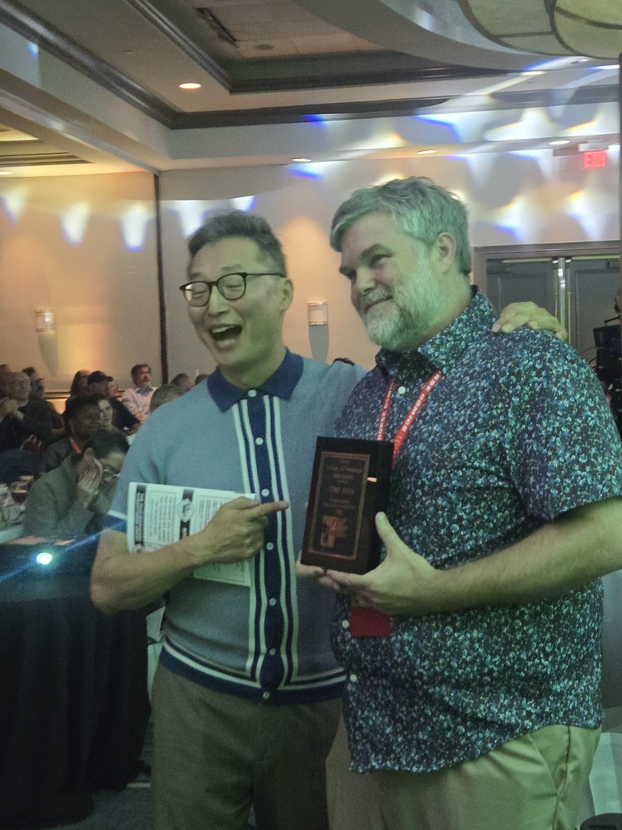 heroinitiative's tweet photo. Congratulations to Jeffrey Brown, recipient of the Dick Giordano Humanitarian of the Year Award! @GeneHa presented him with the honor tonight at the @ringoawards during @baltimorecomics. Thank you, Jeffrey, for showing up for the comics community. #BeTheHero #BCC2026 https://t.co/jEbSqSpbgs