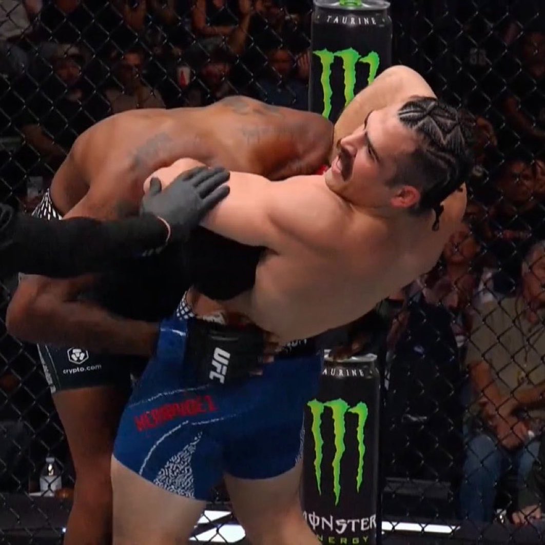 Polymarket's tweet photo. JUST IN: Miami police officer Luis Hernandez makes UFC debut against convicted felon Sedriques Dumas, walks out to “Sound of da Police,” then chokes Dumas out just 57 seconds into the fight. https://t.co/xPRFIRDB4X