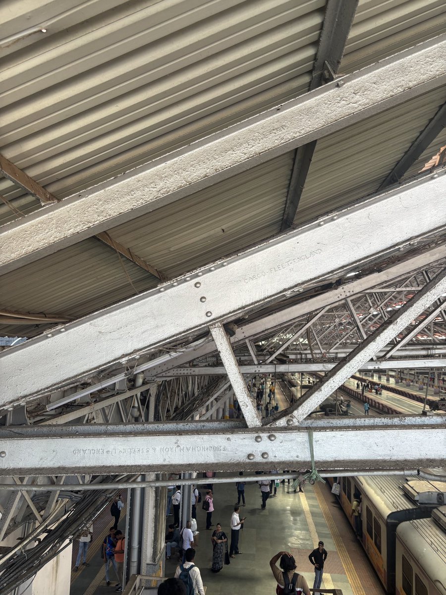 mumbaiheritage's tweet photo. The beams at the Chhatrapati Shivaji Maharaj Terminus (Victoria Terminus) still carry inscriptions “FRODINGHAM IRON & STEEL CO LTD ENGLAND” and “CARGO-FLEET-ENGLAND.”

This steel was produced between 1904 and 1912. The firm’s ironmaking history dates back to the 1860s.

It might be grubby and a little rusted today, but look closely and you’re looking at steel that has witnessed more than a century of Mumbai’s history.

A remarkable testament to the engineering of another era.
#IndianRailways #OldMumbai