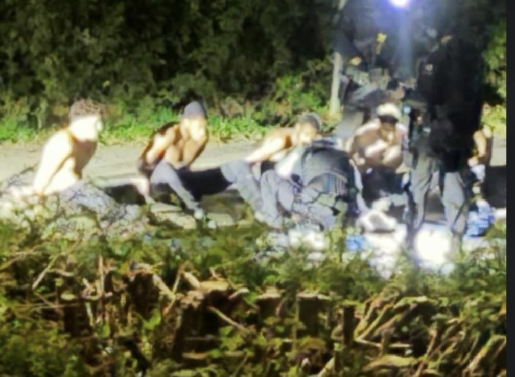 Truthhurts101UK's tweet photo. BREAKING: This appears to be the first image to emerge of the suspects following today’s major incident.

Sent to me by a local resident, the image appears to show five suspects detained on the ground in handcuffs, surrounded by armed officers.

The photo was taken from a neighbouring property.

More updates from the scene as we get them.