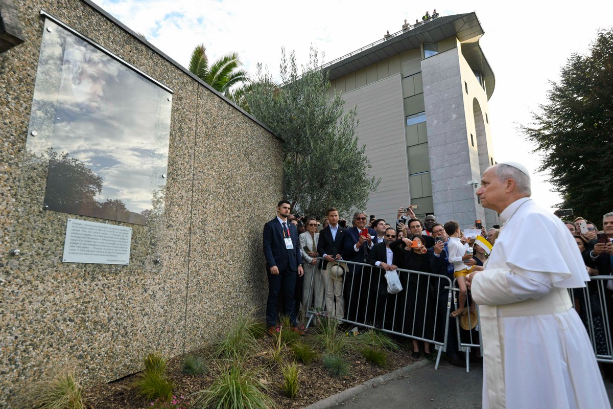 CatholicNewsSvc's tweet photo. Before meeting with French bishops, Pope Leo stopped at a plaque featuring a quotation from a survivor of abuse. The pope was scheduled to meet privately in Lourdes with a group of victims of abuse by members of the church later in the day. (CNS photo/Vatican Media) https://t.co/7T23QWXIlk