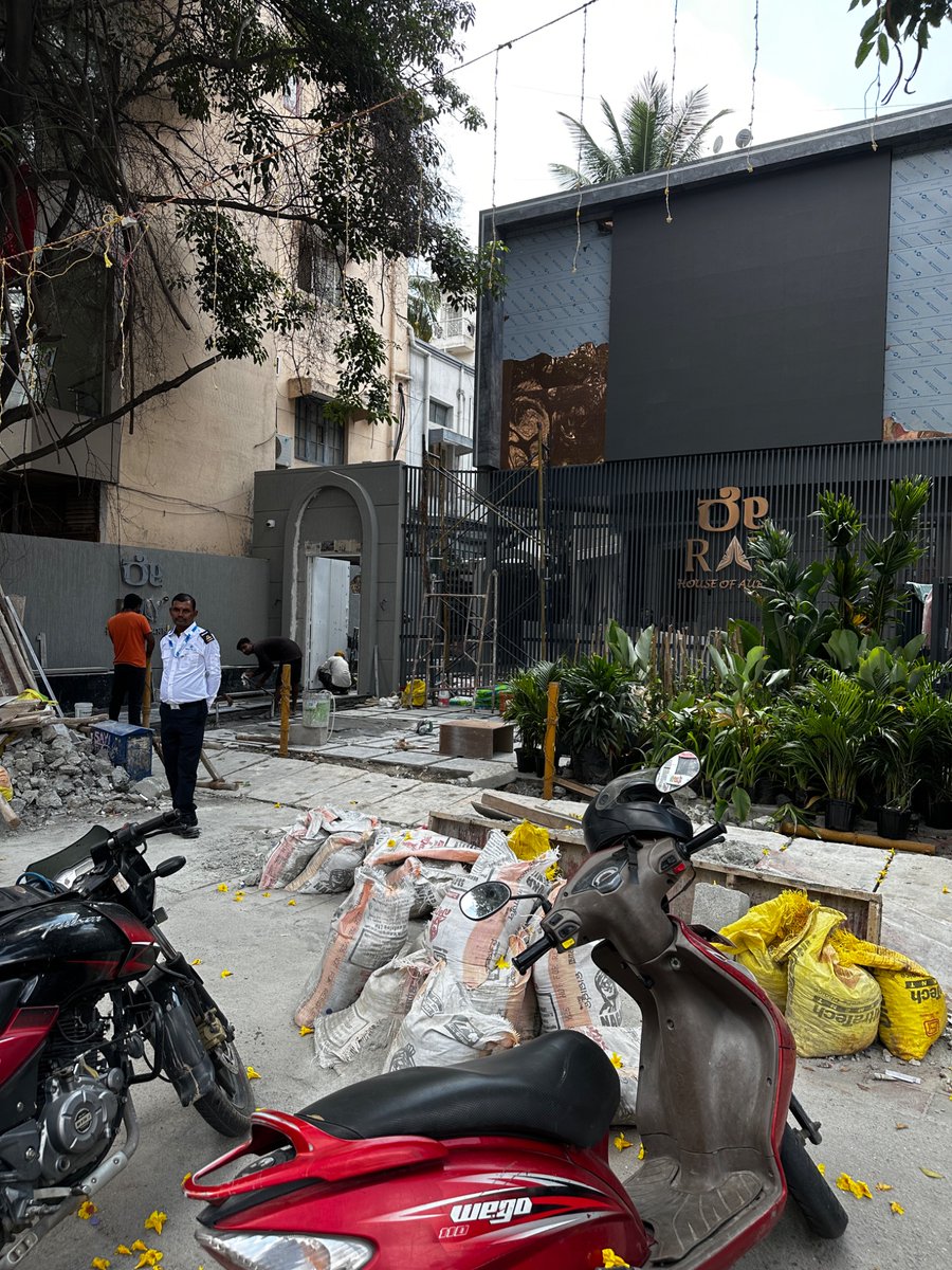 Jameshwari's tweet photo. @GBA_office illegal dumping of construction material on the footpath and drilling and loud construction on Sunday. Please take cognisance and action. This is on the CMR main road, opposite Manyavar showroom, Kalyan Nagar. This violation has been going on since March 2026. https://t.co/TBmwp6eZro