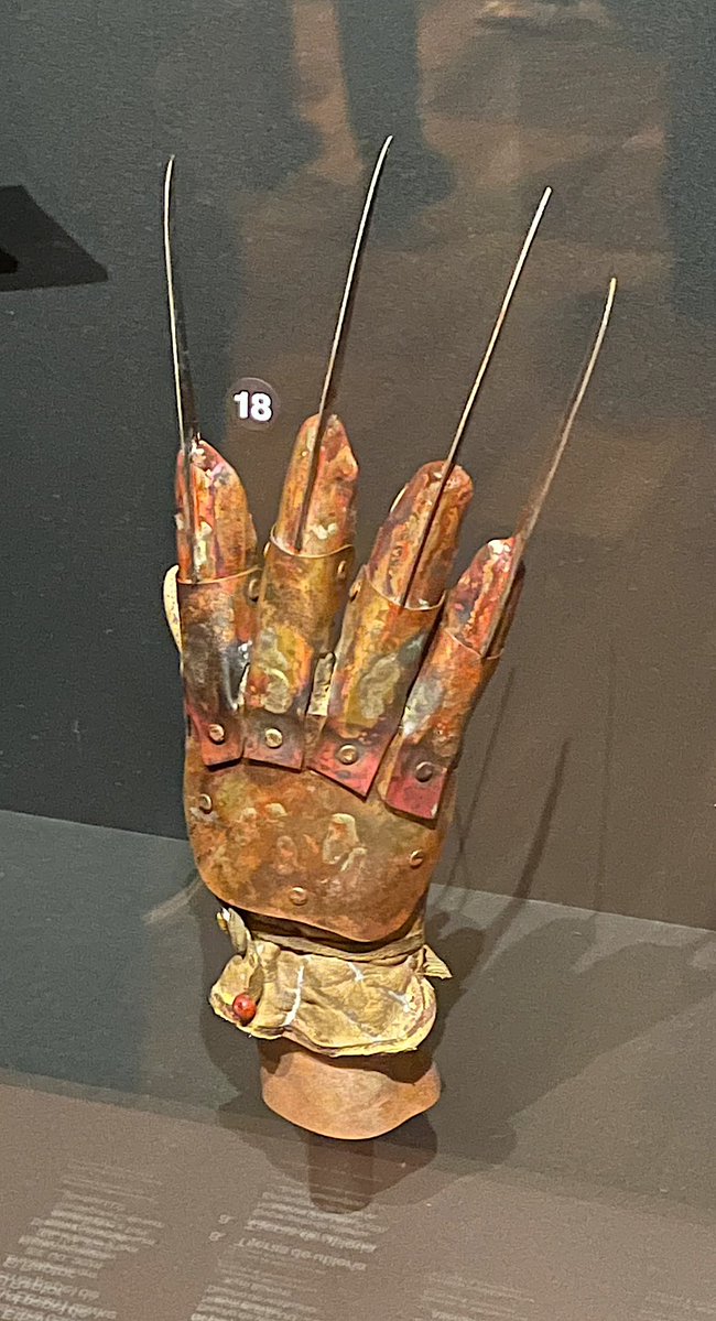 SFXmagazine's tweet photo. @AcademyMuseum @TaraDBennett @Cellarscape SFX attended the press preview of The Horror Show at @academymuseum 🦇

We’re sharing some of our highlights over the weekend… 💀

1. Freddy Krueger’s glove 
2. Freddy and NOES3 prop
3. Get Out chair and teacup 
4. Halloween slate 

#Horror #Halloween #Spooky https://t.co/o5YUvZVUfG