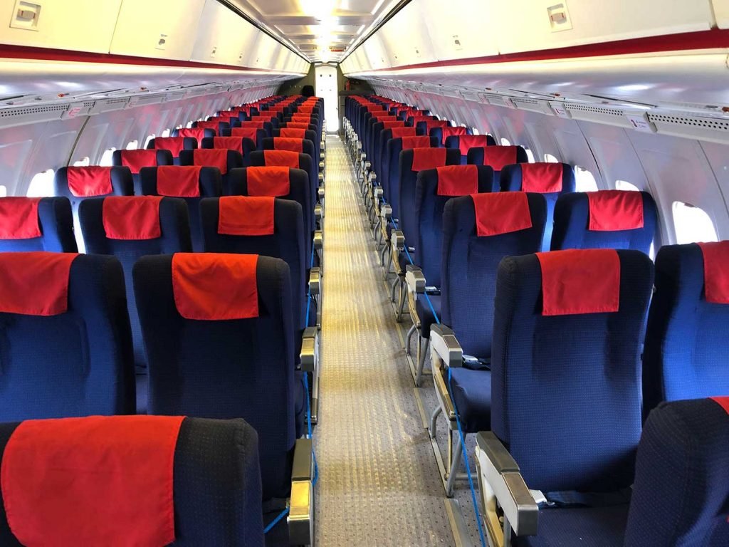 UKBorderWatch's tweet photo. This BAC 1-11 cabin made me forget Concorde

At IWM Duxford near Cambridge, I stepped aboard British Airways BAC 1-11 G-AVMU and found the ordinary passenger world I had come to meet.

I had meant to make straight for Concorde, but the narrow aisle made me turn back for a second look.

The five-abreast cabin-two seats on one side, three on the other-explains its slim fuselage more clearly than a diagram.

Dark blue seats, bright red headrest covers and those little windows suddenly made it easy to picture the familiar shuffle of coats and bags before departure.

I left smiling because one modest cabin had made an old journey feel close enough to join.