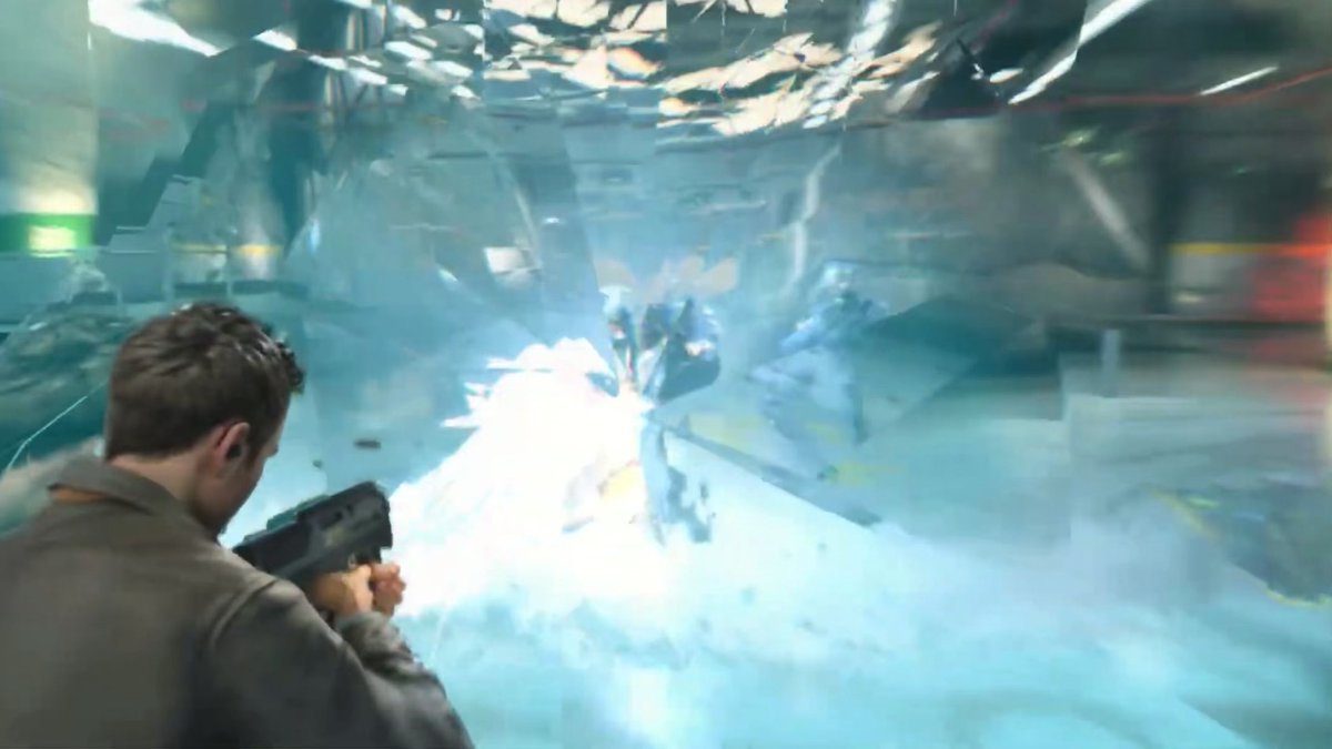 A man in a brown jacket fires a futuristic weapon at a heavily armored enemy in a high-tech industrial facility, with energy blasts and shattered glass filling the air—capturing the intense, cinematic action sequences that the post praises as defining *Quantum Break* as Xbox's standout exclusive of the past 13 years.