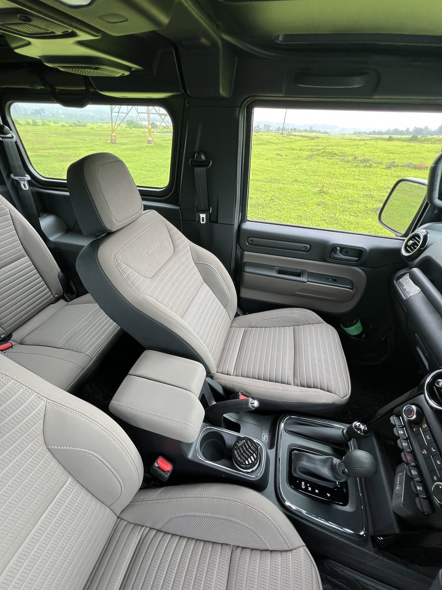 Parth_Go's tweet photo. The Mahindra Thar OG (that’s what it is called now) has just got a whole lot better.

I drove the diesel automatic 4x4 ZXT extensively, and the biggest change is how much more comfortable and easy to live with it has become.

The ride quality is significantly better than before. It is less bumpy and feels more settled on bad roads. Yes, it is still a body-on-frame off-roader, so there is some horizontal movement and it isn’t as plush as a monocoque SUV, but the improvement is massive. It feels much more practical for everyday use now.

The steering is also much lighter, similar to the Thar Roxx and Scorpio N, making the Thar much easier to drive in the city.

The 2.2-litre diesel continues to impress with strong performance, good efficiency and, of course, the Thar’s legendary off-road ability.

The longer feature list is welcome too, while the cosmetic changes give it a fresher look. The new grille looks great and the LED headlamps are a nice addition.

I do wish Mahindra had added a few more features, especially ventilated seats and an auto-dimming IRVM.

The Thar OG has always had the character. Now, it has become a lot more livable too.

I drove the diesel automatic 4x4 ZXT, which costs around ₹23 lakh on-road in Mumbai